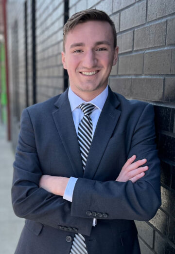 Thomas Bean, committed Account Associate at LS2group, known for his hands-on roles in legislative sessions, startup culture, and collegiate soccer representation.