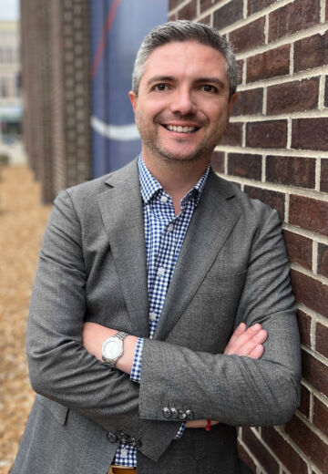 Chris Stoller Michelena, adept in public affairs and policy, with a background in diverse community engagement and governmental advisory roles.